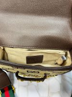 کیف دوشی زنانه گوچی مدل منوگرام کرم قهوه‌ای