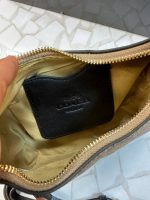 خرید کیف دوشی زنانه کوچ (COACH) مدل دستی و شانه‌ای طرح‌دار و ساده
